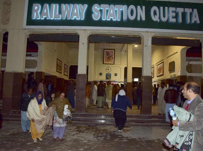 Passengers rescued by security forces from a passenger train attacked by insurgents arrive at a railway station in Quetta, Pakistan, Wednesday, March 12, 2025. (AP Photo/Arshad Butt)