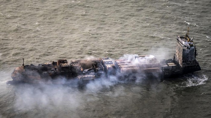 The Solong container drifts in the Humber Estuary, off the coast of East Yorkshire, following a collision on Monday with the MV Stena Immaculate oil tanker, operating as part of the US government's Tanker Security Programme, Tuesday March 11, 2025. (Danny Lawson/PA via AP)