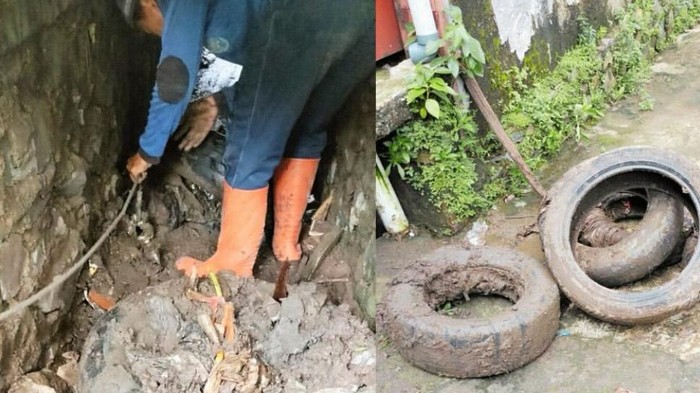 Petugas Dinas Pekerjaan Umum dan Penataan Ruang (Dinas PUPR) Kota Depok membersihkan gorong-gorong di Jalan KSU, Depok. (dok. ist)