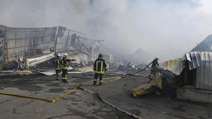 Fires burn after a Russian drone attack near Odesa, Ukraine, Tuesday, March 11, 2025. (AP Photo/Michael Shtekel)