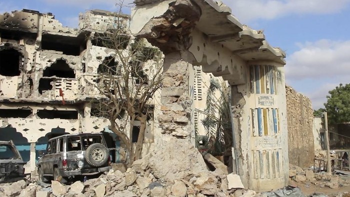 Frame grab from video shoot Wednesday, March 12, 2025, showing the aftermath of a car bomb exploded Tuesday at a hotel in the central Somali city of Beledweyne, kicking off an hourslong militant attack that killed an unknown number of people. (AP Photo from video)