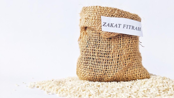 Rice grains in a burlap sack for zakat, the Islamic concept of zakat in the holy month of Ramadan