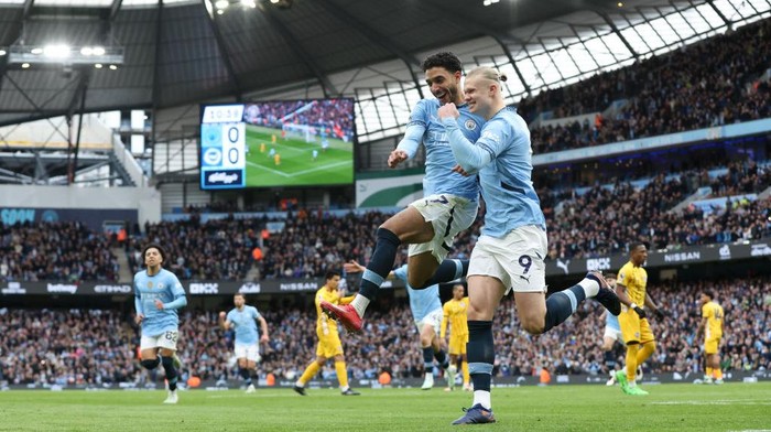 MANCHESTER, ENGLAND - MARCH 15: Erling Haaland of Manchester City celebrates their goal to make it 1-0 during the Premier League match between Manchester City FC and Brighton & Hove Albion FC at Etihad Stadium on March 15, 2025 in Manchester, England. (Photo by MB Media/Getty Images)