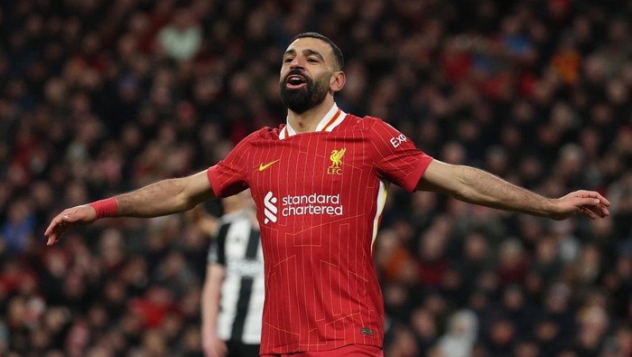 Soccer Football - Premier League - Liverpool v Newcastle United - Anfield, Liverpool, Britain - February 26, 2025 Liverpools Mohamed Salah reacts after Alexis Mac Allister scores their second goal REUTERS/Phil Noble EDITORIAL USE ONLY. NO USE WITH UNAUTHORIZED AUDIO, VIDEO, DATA, FIXTURE LISTS, CLUB/LEAGUE LOGOS OR LIVE SERVICES. ONLINE IN-MATCH USE LIMITED TO 120 IMAGES, NO VIDEO EMULATION. NO USE IN BETTING, GAMES OR SINGLE CLUB/LEAGUE/PLAYER PUBLICATIONS. PLEASE CONTACT YOUR ACCOUNT REPRESENTATIVE FOR FURTHER DETAILS..