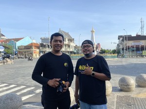 Cerita Street Fotografer di Tugu Jogja, Raup Cuan Jutaan Berkat Tren Lari