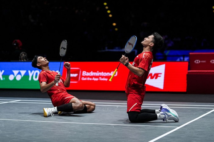 BIRMINGHAM, ENGLAND - MARCH 15: Leo Rolly Carnando (R) and Bagas Maulana of Indonesia celebrate the victory in the Mens Doubles Semi Finals match against Sabar Karyaman Gutama and Moh Reza Pahlevi Isfahani of Indonesia on day five of the Yonex All England Open Badminton Championships at Utilita Arena Birmingham on March 15, 2025 in Birmingham, England. (Photo by Shi Tang/Getty Images)