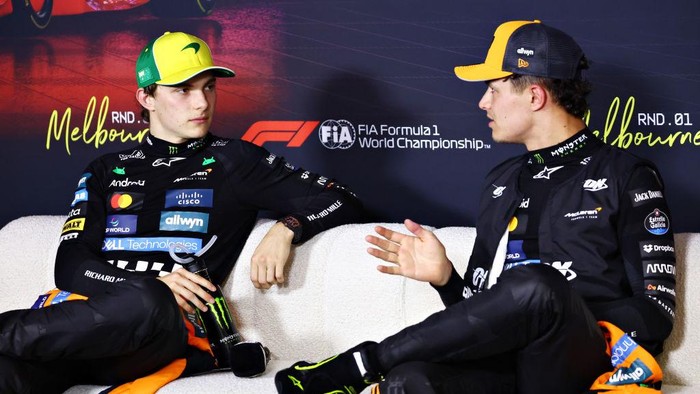 MELBOURNE, AUSTRALIA - MARCH 15: Second placed qualifier Oscar Piastri of Australia and McLaren and Pole position qualifier Lando Norris of Great Britain and McLaren talk in the Drivers Press Conference during qualifying ahead of the F1 Grand Prix of Australia at Albert Park Grand Prix Circuit on March 15, 2025 in Melbourne, Australia. (Photo by Clive Rose/Getty Images)