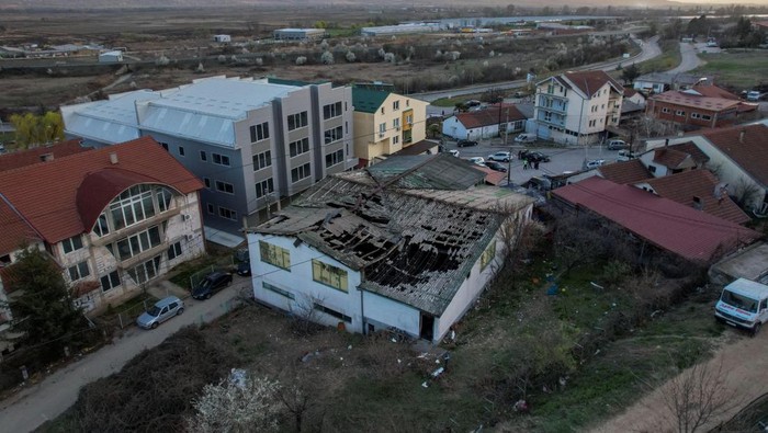 People react outside a hospital, following a fire in a night club resulting in casualties, in the town of Kocani, North Macedonia, March 16, 2025. REUTERS/Alexandros Avramidis