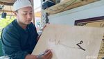 Raup Cuan dari Kaligrafi Lukis Bakar