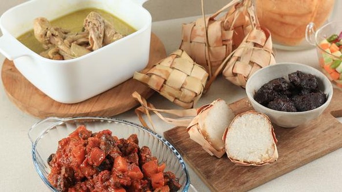 Lebaran Menu with Rendang, Ketupat, Opor, and Sambal Goreng. Indonesian Style Eid Al Fitr Festive Food