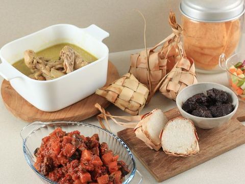 Lebaran Menu with Rendang, Ketupat, Opor, and Sambal Goreng. Indonesian Style Eid Al Fitr Festive Food