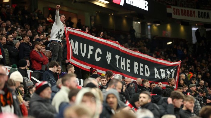 MANCHESTER, ENGLAND - MARCH 13: Fans of Manchester United hold up a banner prior to the UEFA Europa League 2024/25 Round of 16 Second Leg match between Manchester United and Real Sociedad de Futbol at Old Trafford on March 13, 2025 in Manchester, England. (Photo by Jan Kruger - UEFA/UEFA via Getty Images)