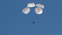 Support teams onboard the SpaceX recovery ship MEGAN work around a SpaceX Dragon spacecraft shortly after it landed with NASA astronauts Nick Hague, Suni Williams, Butch Wilmore, and Roscosmos cosmonaut Aleksandr Gorbunov aboard in the water off the coast of Tallahassee, Florida, Tuesday, March 18, 2025. NASA/Keegan Barber/ Handout via REUTERS
