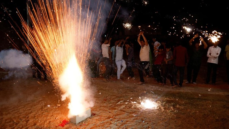 People celebrate after the splashdown of the SpaceX Dragon spacecraft and the safe return of U.S. astronaut Sunita Williams at her native village of Jhulasan in the western Indian state of Gujarat, India March 19, 2025. REUTERS/Amit Dave     TPX IMAGES OF THE DAY