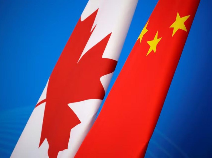 Flags of Canada and China are placed for the first China-Canada economic and financial strategy dialogue in Beijing, China, November 12, 2018. REUTERS/Jason Lee/Pool/File Photo Purchase Licensing Rights