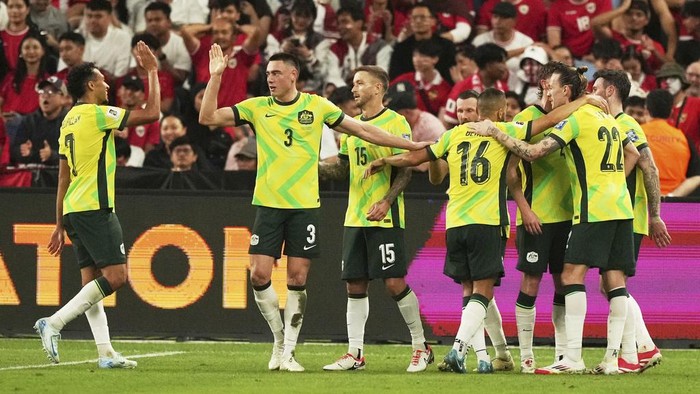 Australias Jackson Irvine, second right, celebrates with teammates after scoring against Indonesia during their soccer World Cup qualifying match at the Sydney Football Stadium, Sydney, Australia, Thursday, March 20, 2025. (AP Photo/Mark Baker)