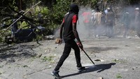 Jaksa penuntut di Amerika Serikat telah mendakwa pemimpin geng Haiti yang berkuasa, Johnson Andre, yang dikenal sebagai Izo, dengan tuduhan menyandera seorang warga negara AS di Haiti, menurut pernyataan dari Kantor Kejaksaan AS di Washington yang dirilis pada hari Selasa. REUTERS/Jean Feguens Regala