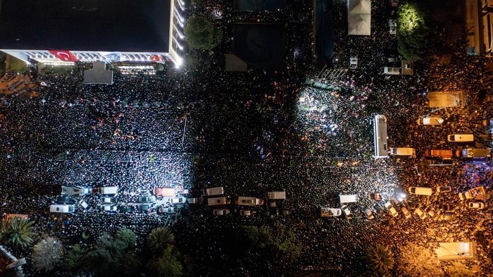 This handout photograph taken and released by the Republican Peoples Party press office on March 19, 2025, shows an aerial view of supporters of Istanbul metropolitan Mayor Ekrem Imamoglu outside Istanbul municipality following his detention over a corruption probe during a demonstration in front of Istanbul Metropolitan Municipality headquarter in Istanbul. Turkish police raided the home of Istanbul Mayor Ekrem Imamoglu on March 19, 2025, detaining him over a corruption probe in a move denounced by the main opposition CHP party as a 