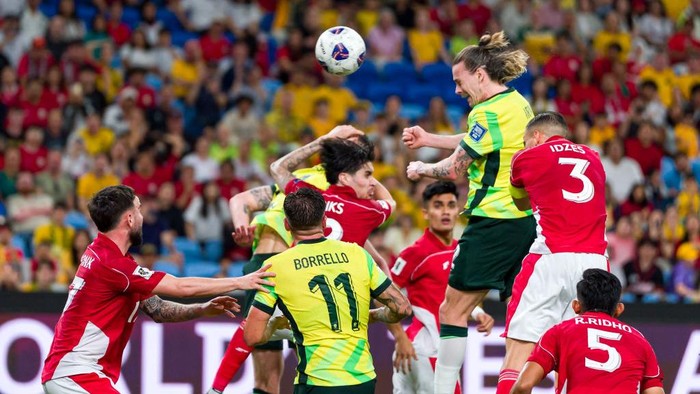 SYDNEY, AUSTRALIA - MARCH 20: Jackson Irvine of Australia heads the ball in for a goal during the round three FIFA 2026 World Cup AFC Asian Qualifier match between Australia Socceroos and Indonesia at Allianz Stadium on March 20, 2025 in Sydney, Australia. (Photo by Andy Cheung/Getty Images)
