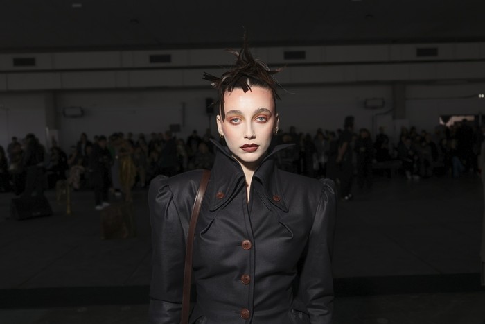 Emma Chamberlain poses for photographers at the Thom Browne Haute Couture Fall-Winter 2024-2025 collection presented Monday, June 24, 2024 in Paris. (Photo by Vianney Le Caer/Invision/AP)