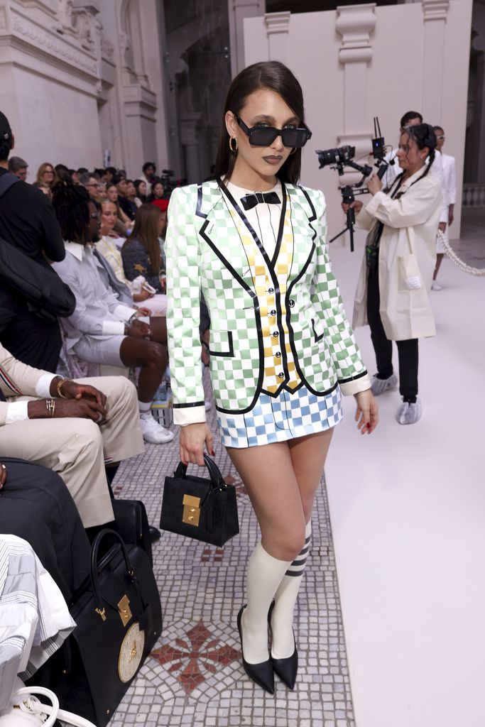 Emma Chamberlain poses for photographers at the Thom Browne Haute Couture Fall-Winter 2024-2025 collection presented Monday, June 24, 2024 in Paris. (Photo by Vianney Le Caer/Invision/AP)