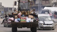 Serangan ini meningkatkan kemungkinan pertempuran penuh kembali terjadi dalam perang yang telah berlangsung selama 17 bulan, yang sebelumnya telah menewaskan puluhan ribu warga Palestina dan menyebabkan kehancuran luas. (AP Photo/Abdel Kareem Hana)  