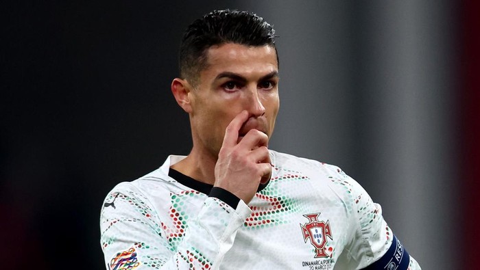 COPENHAGEN, DENMARK - MARCH 20: Cristiano Ronaldo of Portugal reacts during the UEFA Nations League quarterfinal leg one match between Denmark and Portugal at Parken Stadium on March 20, 2025 in Copenhagen, Denmark. (Photo by Joern Pollex - UEFA/UEFA via Getty Images)