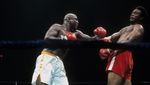 6 Duel Tinju Bersejarah George Foreman: Lawan Muhammad Ali hingga Holyfield