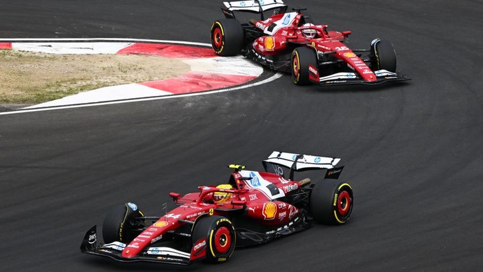 SHANGHAI, CHINA - MARCH 23: Lewis Hamilton of Great Britain driving the (44) Scuderia Ferrari SF-25 leads Charles Leclerc of Monaco driving the (16) Scuderia Ferrari SF-25 on track during the F1 Grand Prix of China at Shanghai International Circuit on March 23, 2025 in Shanghai, China. (Photo by Clive Mason/Getty Images)