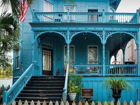 Traditional house in the historic Silk Stocking District in Galveston, Texas, USA on a cloudy day.