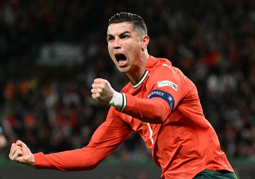 LISBON, PORTUGAL - MARCH 23: Cristiano Ronaldo of Portugal celebrates after scoring a goal during the UEFA Nations League Quarterfinal Leg Two match between Portugal and Denmark at Estadio Jose Alvalade on March 23, 2025 in Lisbon, Portugal. (Photo by Zed Jameson/MB Media/Getty Images)