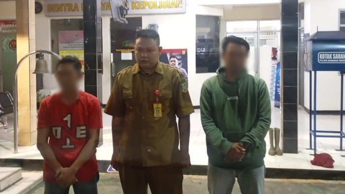 Polisi menangkap ASN gadungan yang memalak THR kepada pedagang di Pasar Induk Cibitung, Bekasi.