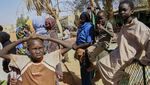 Potret Pilu Keluarga Pengungsi Sudan Berlindung di Gedung Sekolah