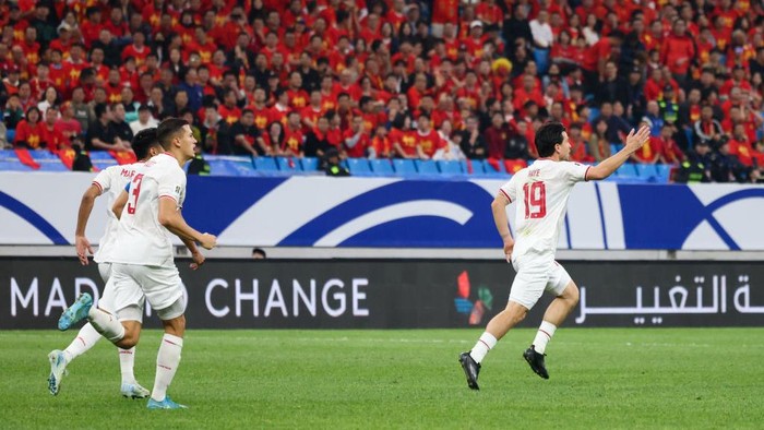 QINGDAO, CHINA - OCTOBER 15: Thom Haye #19 of Indonesia scores a goal and celebrates during the FIFA World Cup Qualifier match between China and Indonesia at Qingdao Youth Football Stadium on October 15, 2024 in Qingdao, China. (Photo by Zhizhao Wu/Getty Images)