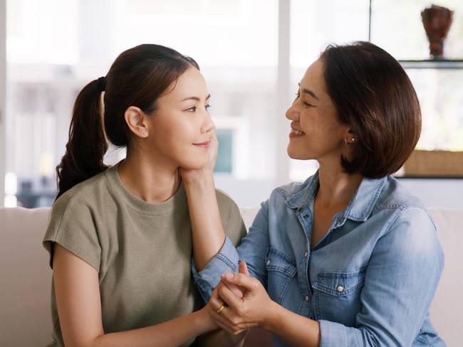 Middle aged asia people old mom love care trust comfort help young teen talk crying stress relief at home. Mum as friend listen adult child woman feel pain sad worry of broken heart life crisis issues