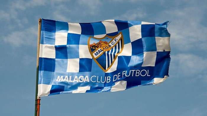 Malaga CF soccer club flag flying from a post Spanish football team. (Photo by: Education Images/Universal Images Group via Getty Images)
