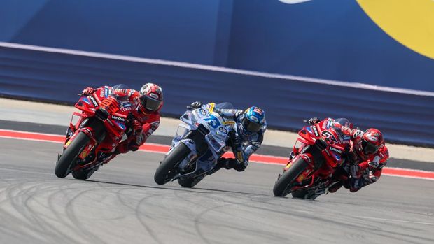 AUSTIN, TX - MARCH 29:  Marc Marquez (93) of Spain and Ducati Lenovo Team leads Alex Marquez (73) of Spain and BK8 Gresini Racing MotoGP and Francesco Bagnaia (63) of Italy and Ducati Lenovo Team out of turn 20 on the opening lap of the Tissot Sprint Race at the MotoGP Red Bull Grand Prix of the Americas on March 29, 2025, at Circuit of The Americas in Austin, Texas. (Photo by David Buono/Icon Sportswire via Getty Images)