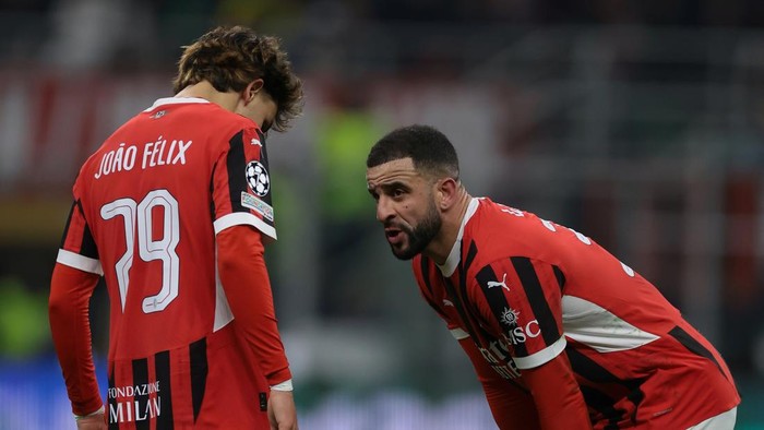 MILAN, ITALY - FEBRUARY 18: Joao Felix and Kyle Walker of AC Milan react during the UEFA Champions League 2024/25 League Knockout Play-off second leg match between AC Milan and Feyenoord at San Siro Stadium on February 18, 2025 in Milan, Italy. (Photo by Jonathan Moscrop/Getty Images)