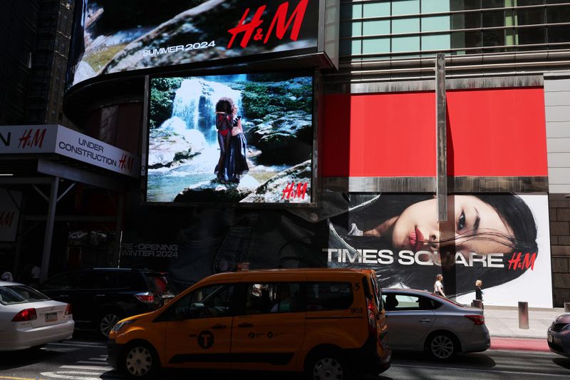 NEW YORK, NEW YORK - JULY 01: H&M ads are seen at a future store location in Times Square on July 01, 2024 in New York City. (Photo by Michael M. Santiago/Getty Images)
