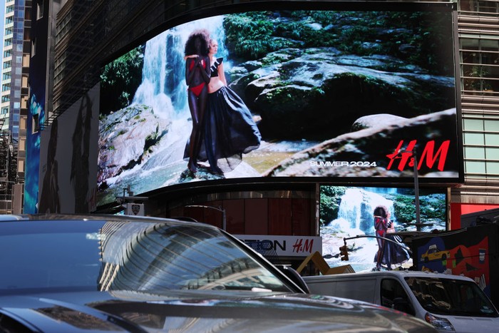 NEW YORK, NEW YORK - JULY 01: H&M ads are seen at a future store location in Times Square on July 01, 2024 in New York City. (Photo by Michael M. Santiago/Getty Images)