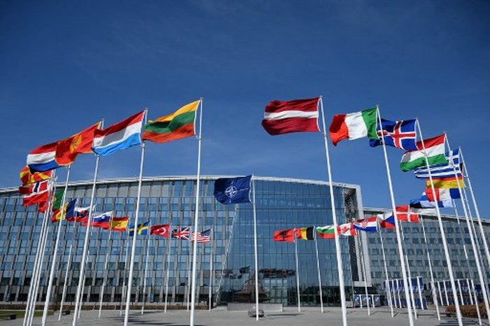 This photograph shows the North-Atlantic Treaty Organisations (NATO) flag and member states flags at the NATO headquarters in Brussels on April 2, 2025. (Photo by Nicolas TUCAT / AFP)