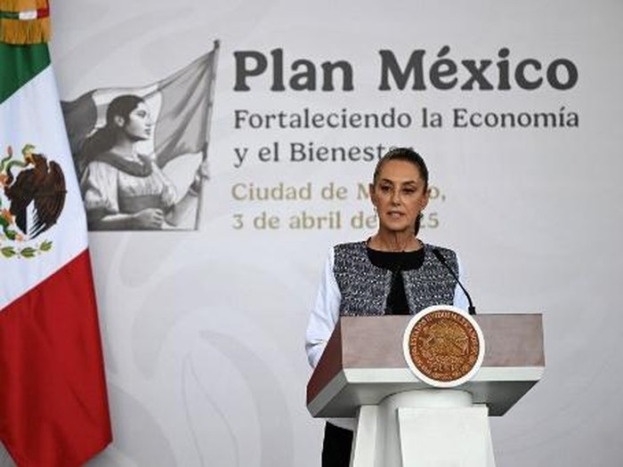Mexicos President Claudia Sheinbaum speaks during the presentation of the so-called Plan Mexico aimed at strengthening the economy at the Anthropology Museum in Mexico City on April 3, 2025. Mexican President Claudia Sheinbaum welcomed her country being excluded from the list of nations targeted in US President Donald Trumps latest round of tariffs. (Photo by Yuri CORTEZ / AFP)