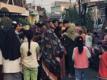 Semarak Tradisi Udik-udik di Gresik, Berebut Koin Saat Lebaran Ketupat