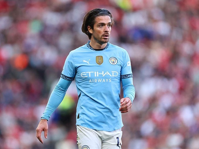 MANCHESTER, ENGLAND - APRIL 6: Jack Grealish of Manchester City during the Premier League match between Manchester United FC and Manchester City FC at Old Trafford on April 6, 2025 in Manchester, England. (Photo by Robbie Jay Barratt - AMA/Getty Images)
