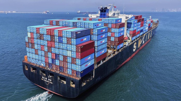 A container ship sails off from a container terminal in Qingdao in eastern Chinas Shandong province Sunday, April 6, 2025. (Chinatopix Via AP)