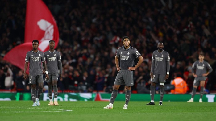 Soccer Football - Champions League - Quarter Final - First Leg - Arsenal v Real Madrid - Emirates Stadium, London, Britain - April 8, 2025 Real Madrids Jude Bellingham looks dejected after Arsenals Mikel Merino scores their third goal Action Images via Reuters/Matthew Childs