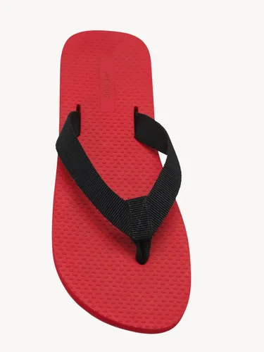 Sandal jepit dari The Row.
