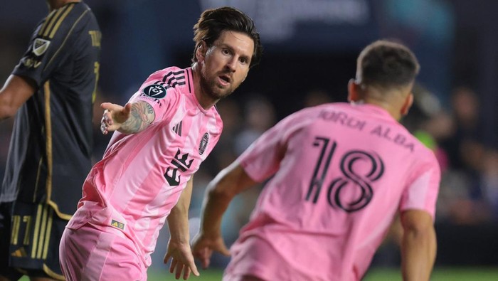 Apr 9, 2025; Ft. Lauderdale, Florida, USA; Inter Miami CF forward Lionel Messi (10) celebrates with defender Jordi Alba (18) after scoring against the Los Angeles FC during the first half at Chase Stadium. Mandatory Credit: Sam Navarro-Imagn Images