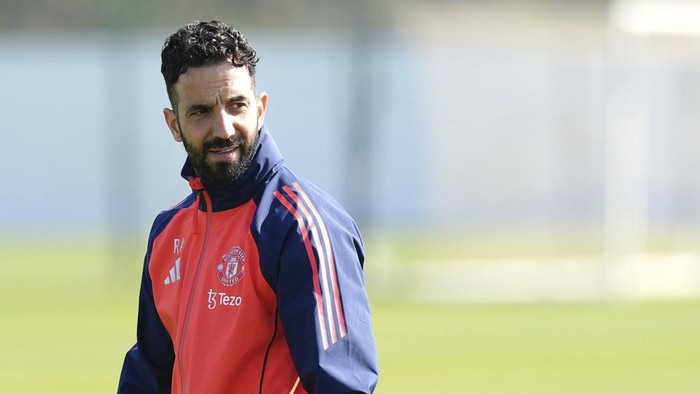Manchester United manager Ruben Amorim attends a training session ahead of the Europa League quarterfinal first leg soccer match against Lyon, at Trafford Training Centre, Carrington, England, Wednesday, April 9, 2025. (Martin Rickett/PA via AP)