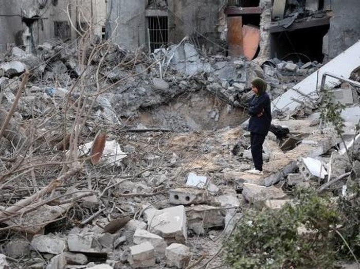 Rubble is piled up in the aftermath of an Israeli strike on the Al-Ahli hospital, also known as the Baptist or Ahli Arab hospital, in Gaza City on April 13, 2025. Gazas civil defence agency said an Israeli airstrike destroyed parts of the hospital early on April 13, after Israel seized a corridor in the war-battered Palestinian territory and said it planned to expand its military offensive. (Photo by Omar AL-QATTAA / AFP)